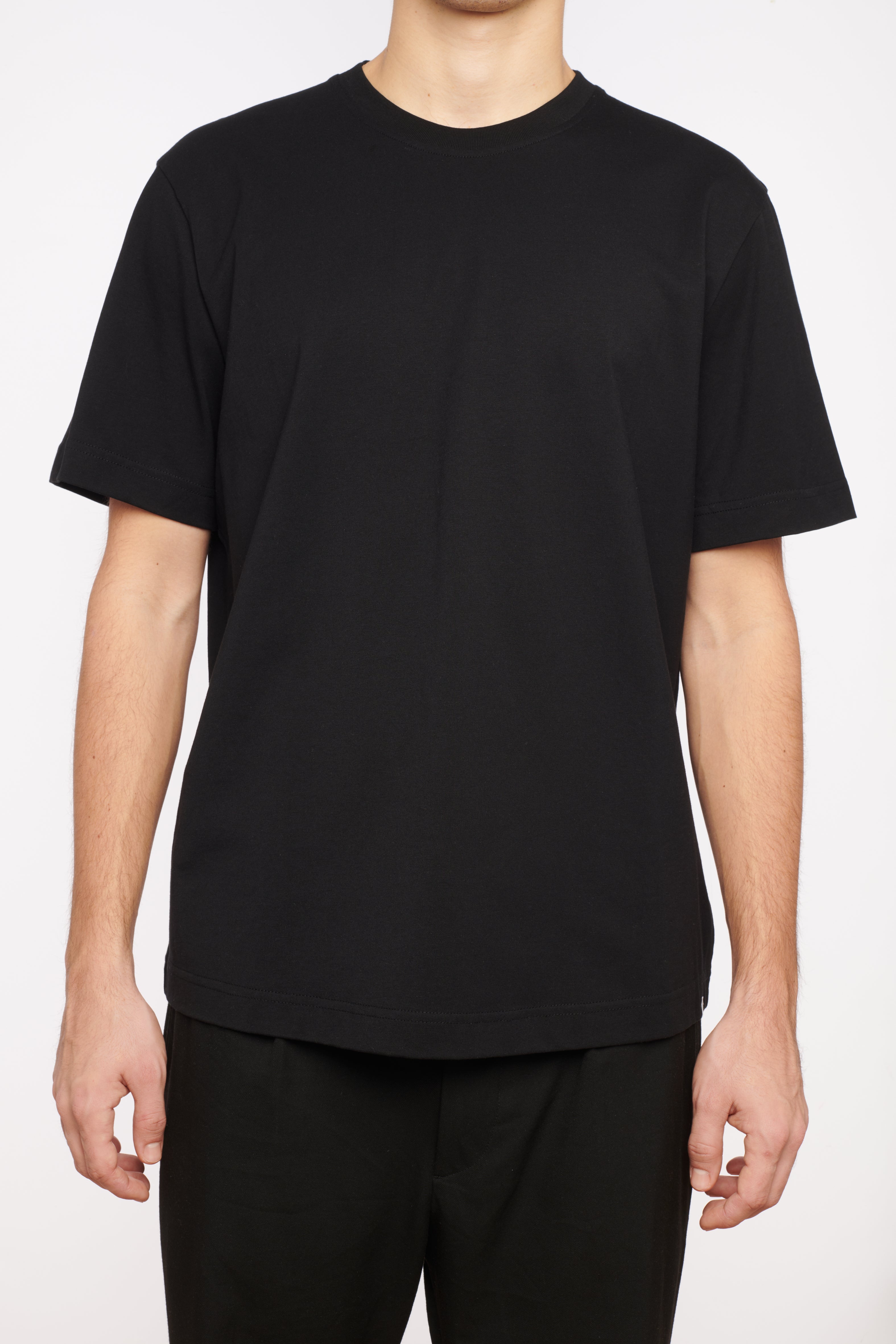 Circular shirt made of organic cotton, color black, front view, made in Portugal