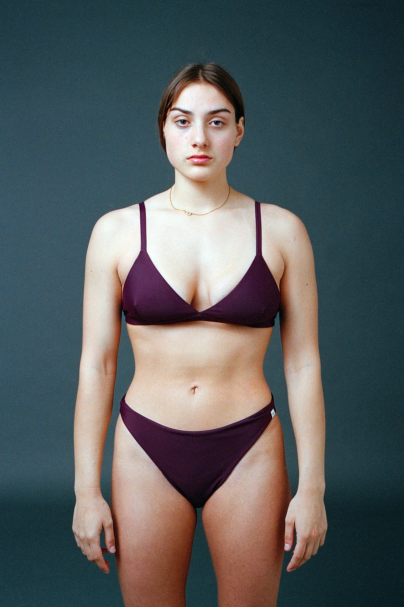 Sustainable bikini made from recycled nylon, color eggplant, studio shot, made locally in Switzerland