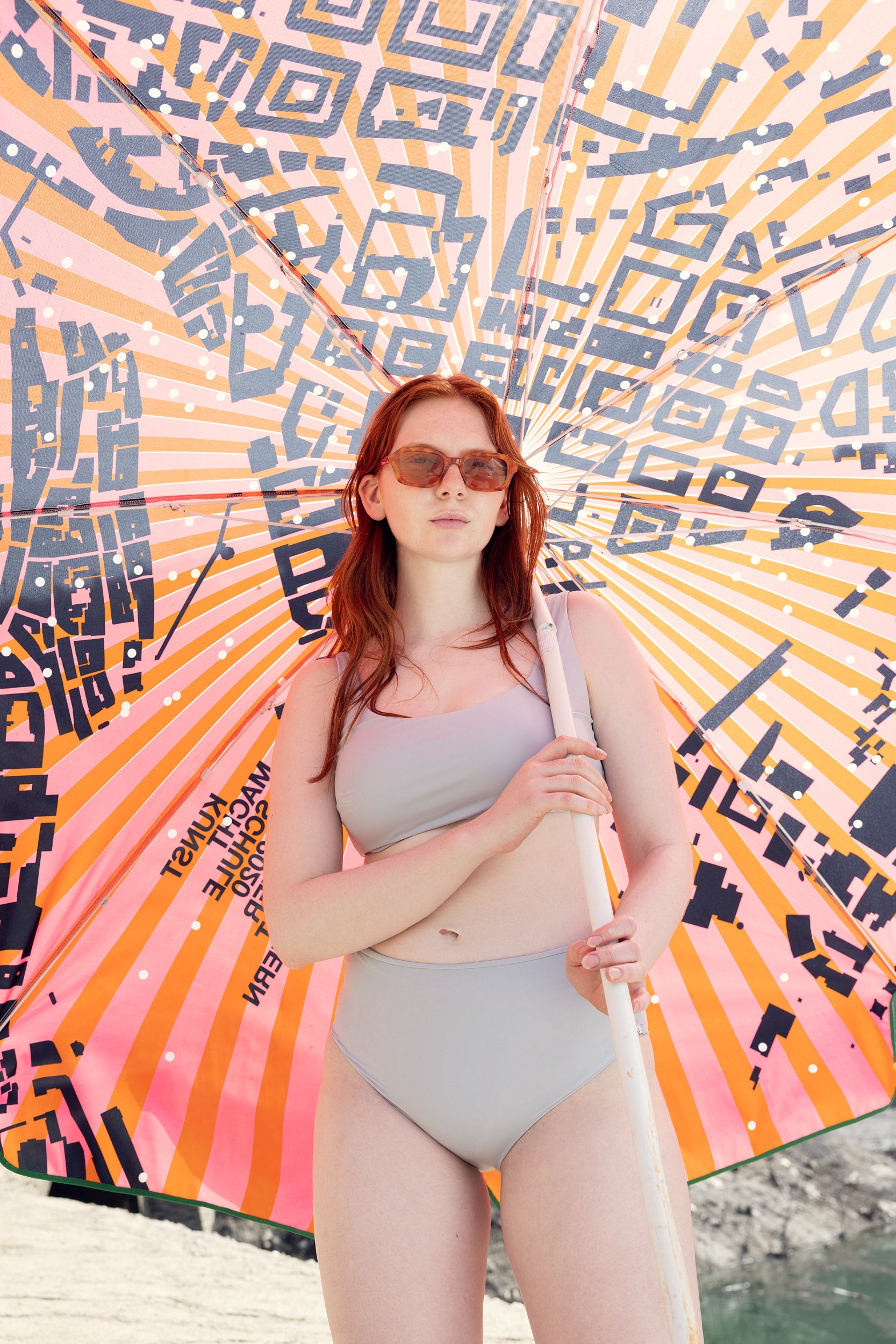 Sustainable bikini made from recycled nylon, color light grey, outdoor, made locally in Switzerland